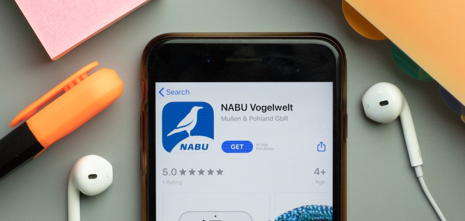 New York, United States - 7 November 2020: NABU Vogelwelt app store logo on phone screen, Illustrative Editorial