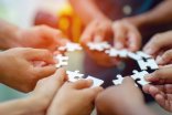 Team work, hands and jig Saw Unite with power Is a good team of Team work, hands and jig Saw Unite with power Is a good team of