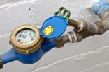 Wasseruhr Wasseruhr an einem Wasserrohr
