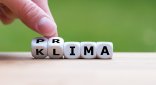 Würfel bilden die Worte "Prima Klima" Ein Würfel bildet die Wörter Prima Klima