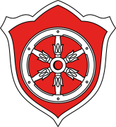 Gernsheimer Stadtwappen welches in Ziegelrot und weiß dargestellt ist und das Mainzer Rad beinhaltet.