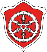Gernsheimer Stadtwappen welches in Ziegelrot und weiß dargestellt ist und das Mainzer Rad beinhaltet.